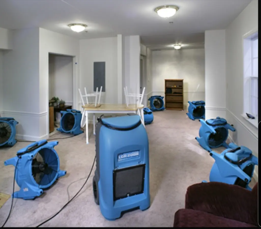 Air movers and dehumidifier setup for Water Damage Restoration in Middle Valley